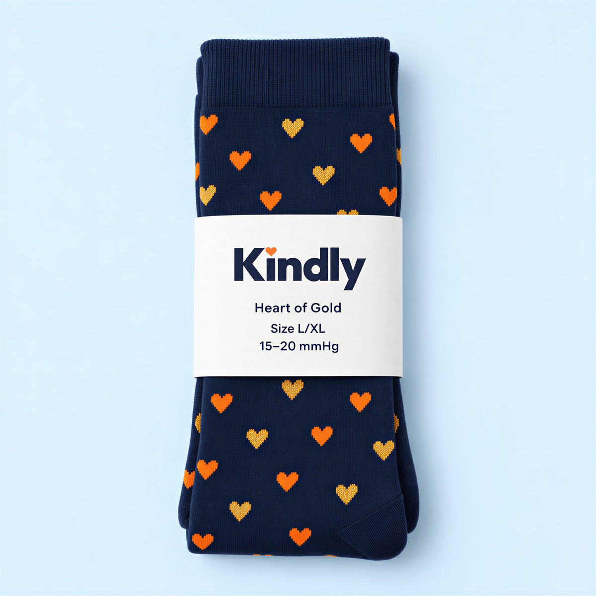 A folded Kindly pair in its paper belly band with print name, size and 15-20 mmHg
