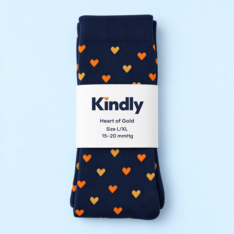 A folded Kindly pair in its paper belly band with print name, size and 15-20 mmHg